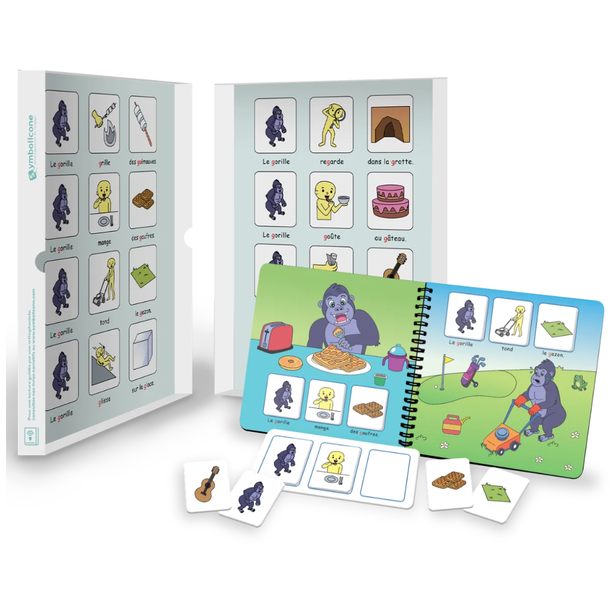 Boîte métallique ouverte d’un livre magnétique du coffret : livret en spirale et pièces