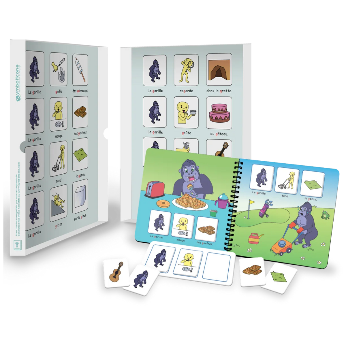 Boîte métallique ouverte d’un livre magnétique du coffret : livret en spirale et pièces