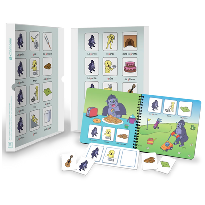 Boîte métallique ouverte d’un livre magnétique du coffret : livret en spirale et pièces