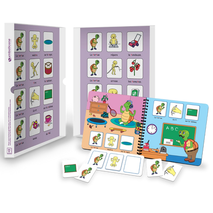 Boîte métallique ouverte d’un livre magnétique du coffret : livret en spirale et pièces