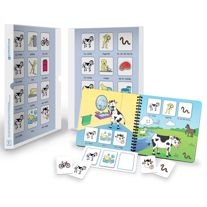 Boîte métallique ouverte d’un livre magnétique du coffret : livret en spirale et pièces
