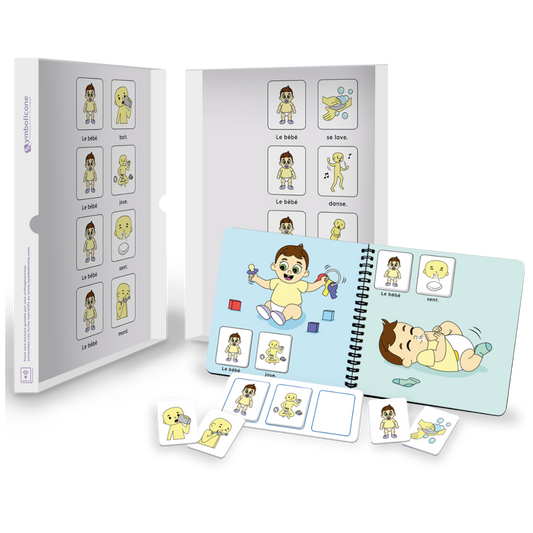 Open metal tin of « Le bébé en action ! »: spiral booklet and magnetic pieces