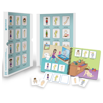 Boîte métallique ouverte d’un livre magnétique du coffret : livret en spirale et pièces